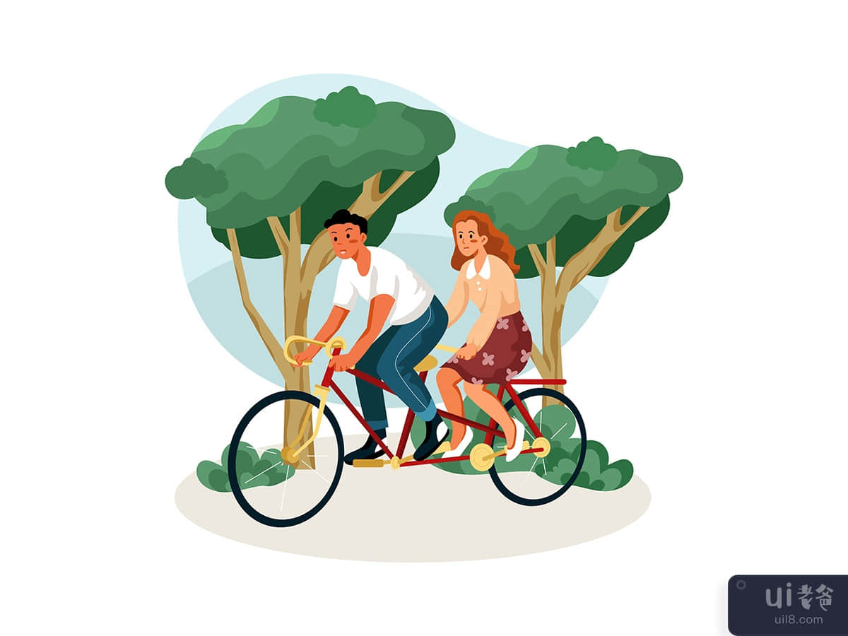 Couple cycling on a double bike in the park